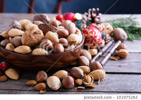 Variety of nuts with shells for Christmas Variety of nuts with shells for Christmas 101975262