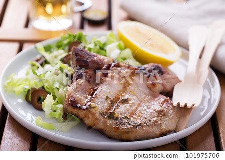Grilled pork with salad Grilled pork with salad 101975706