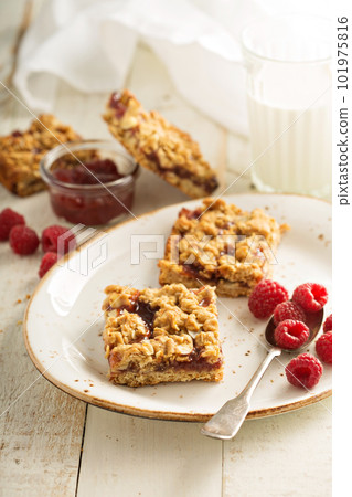 Almond and jam bars 101975816