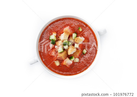 Traditional Spanish gazpacho soup isolated on white background Traditional Spanish gazpacho soup isolated on white background 101976772