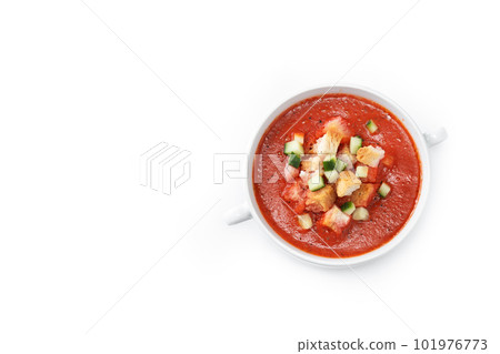 Traditional Spanish gazpacho soup isolated on white background Traditional Spanish gazpacho soup isolated on white background 101976773