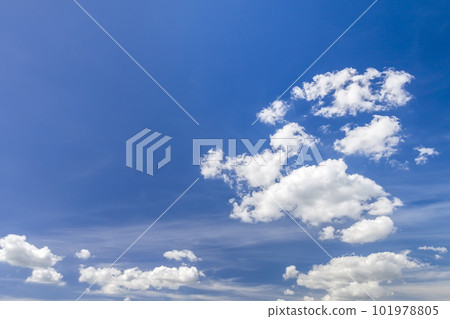 Blue vibrant sky with puffy white clouds Blue vibrant sky with puffy white clouds 101978805
