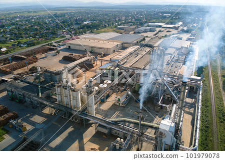 Aerial view of wood processing factory with stacks of lumber at plant manufacturing yard. 101979078