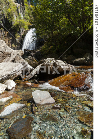 Landscape with Korbu waterfal on a background, vertical photo Landscape with Korbu waterfal on a background, vertical photo 101981167