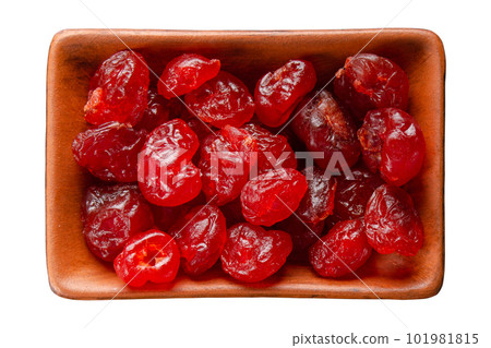 Dried cherries in clay bowl isolated on white flat lay view 101981815