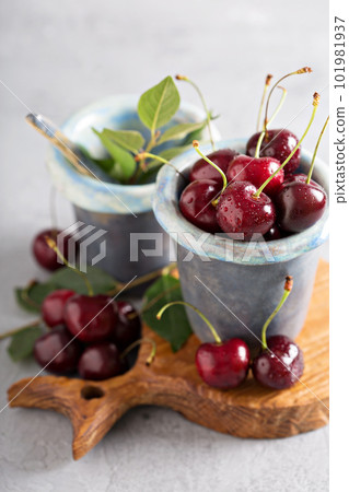 Fresh sweet cherry in a cup Fresh sweet cherry in a cup 101981937