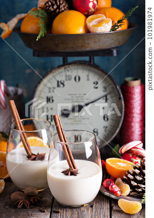 Eggnog with cinnamon in a rustic setting Eggnog with cinnamon in a rustic setting 101981974