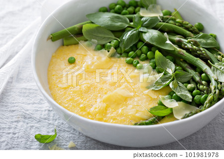 Cheesy polenta with plenty of vegetables Cheesy polenta with plenty of vegetables 101981978