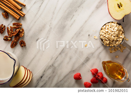 Cooking oatmeal with oats and milk 101982031