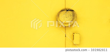 metal yellow doors with a lock abstract background. Monocolor texture pattern with copy space 101982811