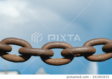 Old rusty metal chain outdoors. Large chain links Old rusty metal chain outdoors. Large chain links 101983635