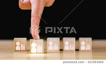 Recruitment concept. Human Resource Manager finds new people to join an organization or support a cause. Index finger points a cube that is best person. Recruitment concept. Human Resource Manager finds new people to join an organization or support a cause. Index finger points a cube that is best person. 101983808