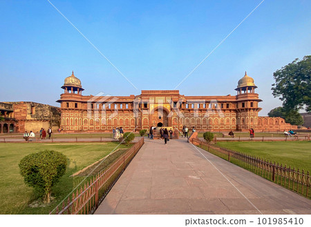 The famous red fort in the city of Agra, India. Tourists visit a popular tourist attraction. The famous red fort in the city of Agra, India. Tourists visit a popular tourist attraction. 101985410