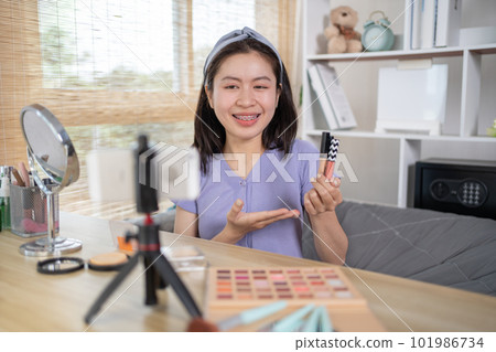 Beautiful women with social media influences recommend products and make-up accessories to be more beautiful, Recording vlog video live streaming, Online business of beauty bloggers. Beautiful women with social media influences recommend products and make-up accessories to be more beautiful, Recording vlog video live streaming, Online business of beauty bloggers. 101986734