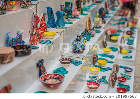 Collection of turkish ceramics on sale at the Grand Bazaar in Istanbul, Turkey. Turkish colorful ornamental ceramic souvenir plates 101987668