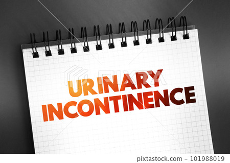 Urinary incontinence - leaking of urine that you can't control, text on notepad, concept background 101988019