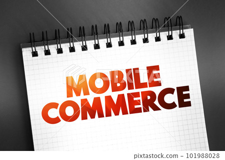 Mobile commerce - using wireless devices to conduct commercial transactions online, text concept on notepad 101988028