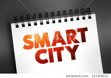 Smart city - technologically modern urban area that uses different types of electronic methods and sensors to collect specific data, text concept on notepad 101988032