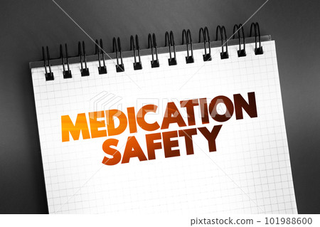 Medication Safety text quote on notepad, health concept background 101988600