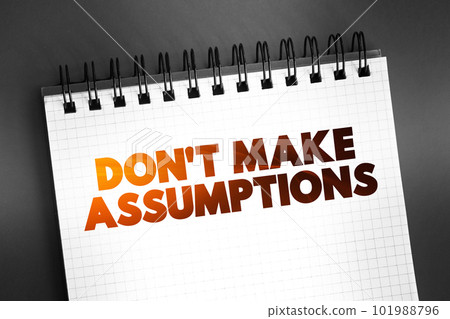 Don't Make Assumptions text on notepad, concept background Don't Make Assumptions text on notepad, concept background 101988796