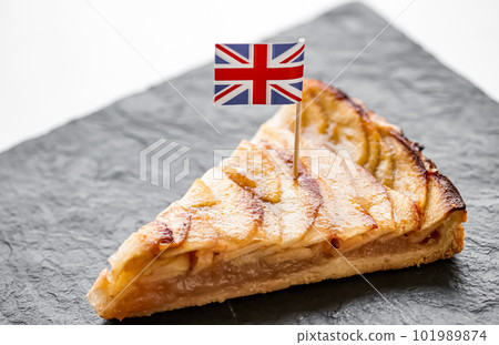 United Kingdom, dessert and bakery, slice of apple tart with British flag 101989874