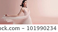 Asian woman with a beautiful face against light pink background - full body studio shot - made with 101990234