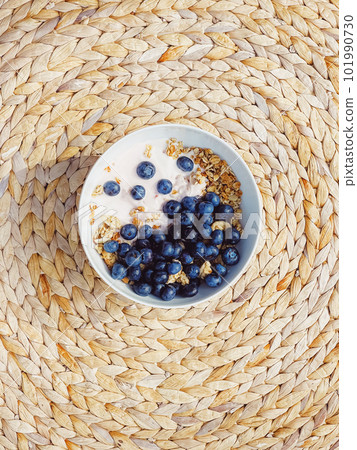 Blueberry yogurt cereal bowl as healthy breakfast and morning meal, sweet food and organic berry fruit, diet and nutrition 101990730