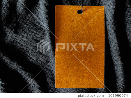 Blank fashion label tag, sale price card on luxury fabric background, shopping and retail 101990974