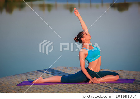 girl doing yoga exercise girl doing yoga exercise 101991314