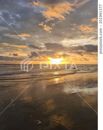 Colorful sunset over beach background Colorful sunset over beach background 101991377