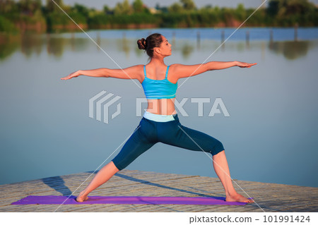 girl doing yoga exercise 101991424