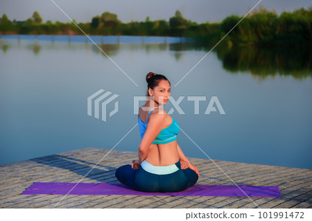 girl doing yoga exercise 101991472