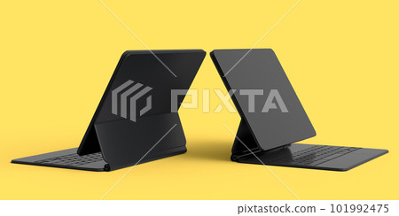 Set of computer tablet with keyboard and blank screen isolated on yellow 101992475