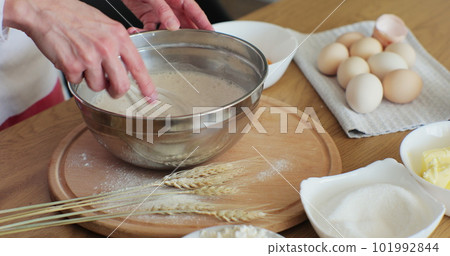 Process of kneading bread dough at home manually,home baking. Making bread at home. Bread baking. 101992844