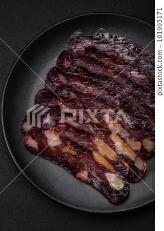 Delicious smoked or cured mahan horse meat sausage with spices and herbs 101993171