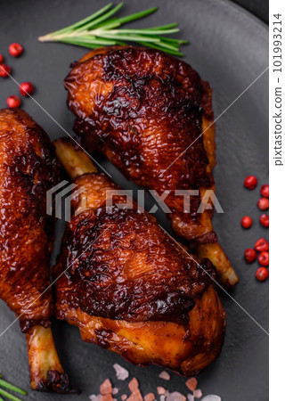 Delicious grilled chicken legs with spices and herbs in teriyaki sauce Delicious grilled chicken legs with spices and herbs in teriyaki sauce 101993214