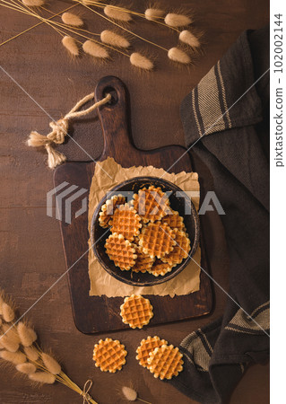 Waffer cookies on ceramic bowl Waffer cookies on ceramic bowl 102002144