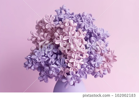 Delicate pink lilac bouquet on pink monochrome background, closeup Delicate pink lilac bouquet on pink monochrome background, closeup 102002183