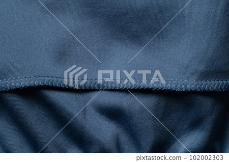 Stitches on blue synthetic material Stitches on blue synthetic material 102002303