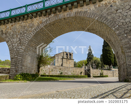Church of Santa Maria and old railway bridge 102003175