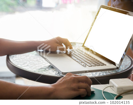 male hands working with a laptop male hands working with a laptop 102014135
