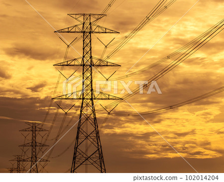 High voltage tower with sunset background 102014204
