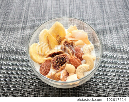 Dried fruit and nuts in yogurt Dried fruit and nuts in yogurt 102017314