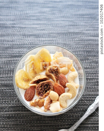 Dried fruit and nuts in yogurt 102017406