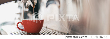 Close up view of preparing coffee espresso in automatic coffee machine in cafe 102018785