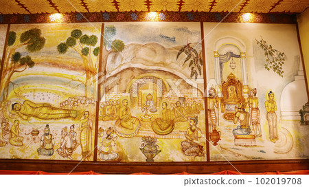 Moments of Lord Buddhas Life Painted on the Wall of Shri Mahabodhi Vihar, Bodh Gaya, Bihar.. 102019708