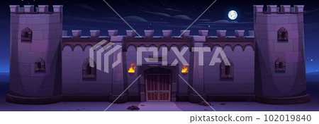 Wall of medieval stone castle at night 102019840