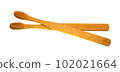 a wooden-handled toothbrush 102021664