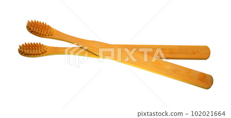 a wooden-handled toothbrush 102021664