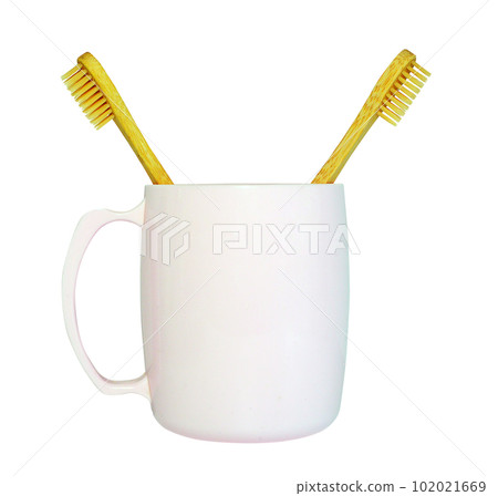 a wooden-handled toothbrush a wooden-handled toothbrush 102021669